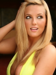 Kaya Danielle in a Bright Yellow Sling One Piece