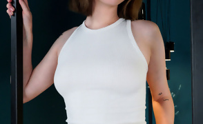 Emma Korti Takes off her Yellow Shorts
