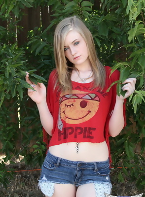 Mandy STripping in the Garden